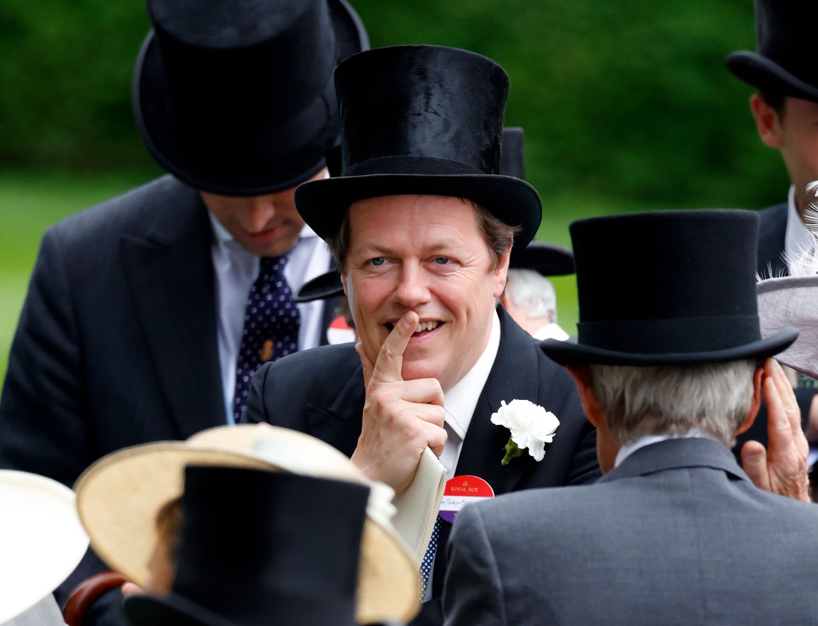 Tom Parker Bowles attended day one of Royal Ascot on June 20, 2023, in England, embracing the event’s traditional attire with a playful smile. As a regular at prestigious gatherings, Tom balances his own public life while staying connected to his mother, Queen Camilla. | Source: Getty Images