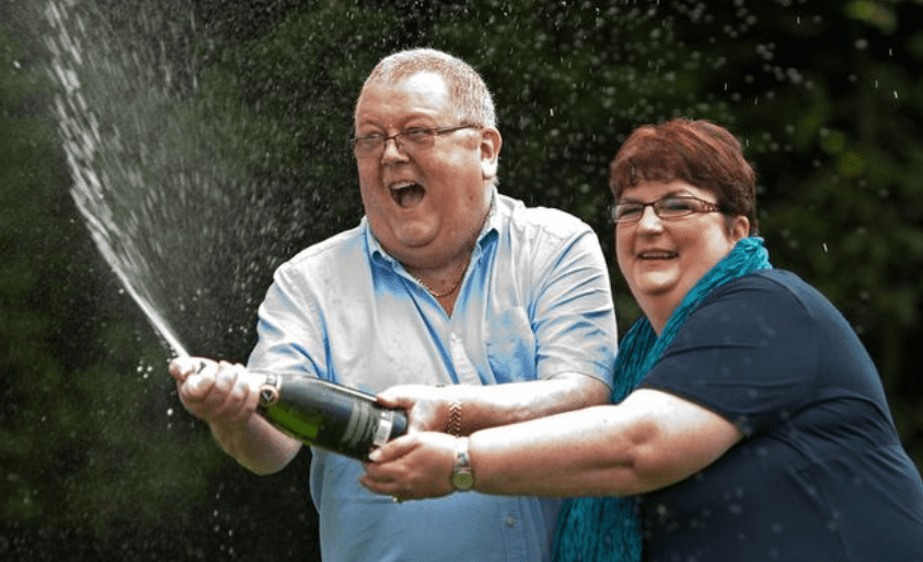 Colin and Christine Weir celebrate their over $220 million Euromillions lottery winnings in 2011 | Photo: Twitter/@DailyMirror