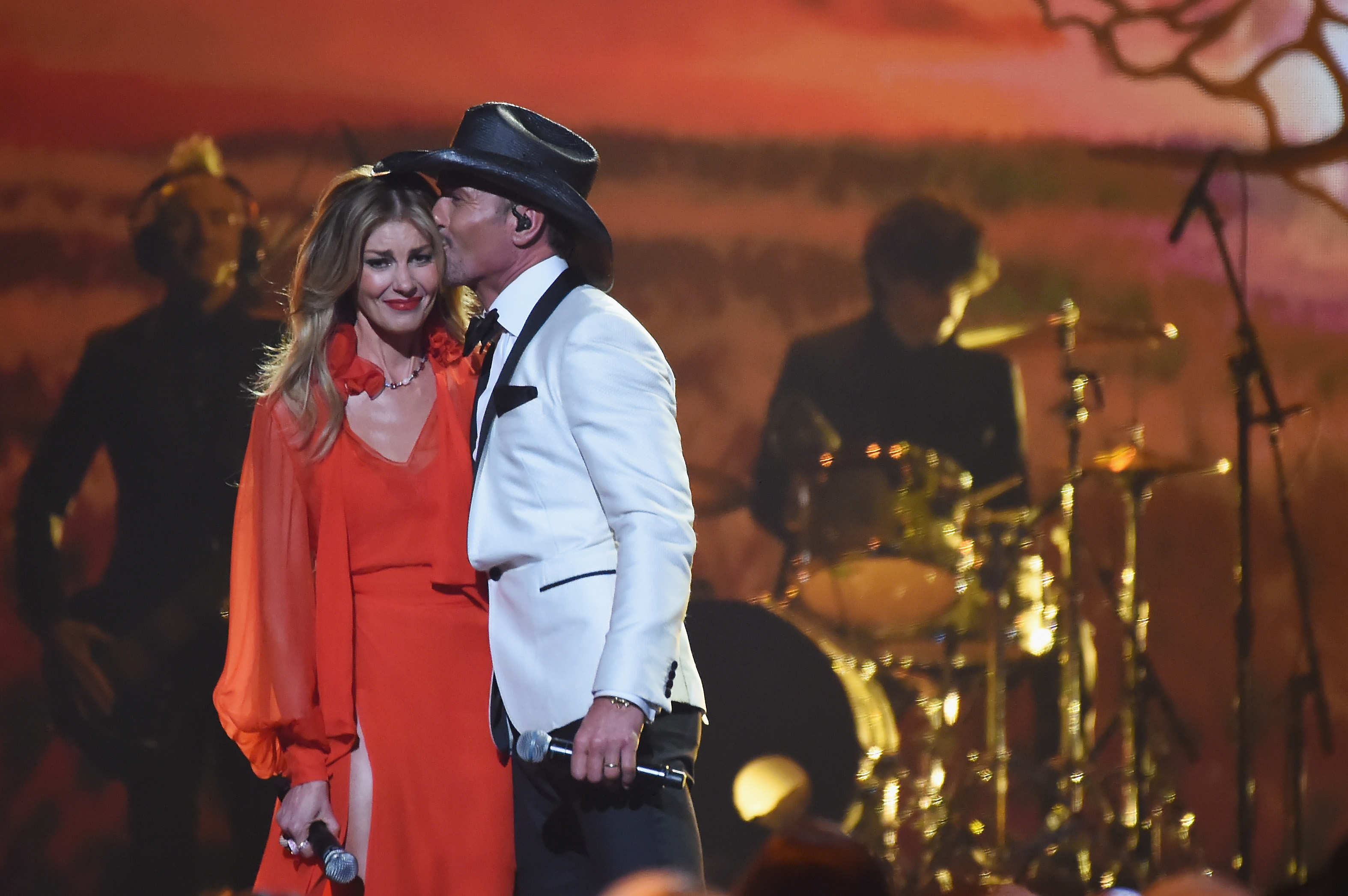 Faith Hill and Tim McGraw perform onstage at the 51st annual CMA Awards in Nashville, Tennessee on November 8, 2017. | Source: Getty Images