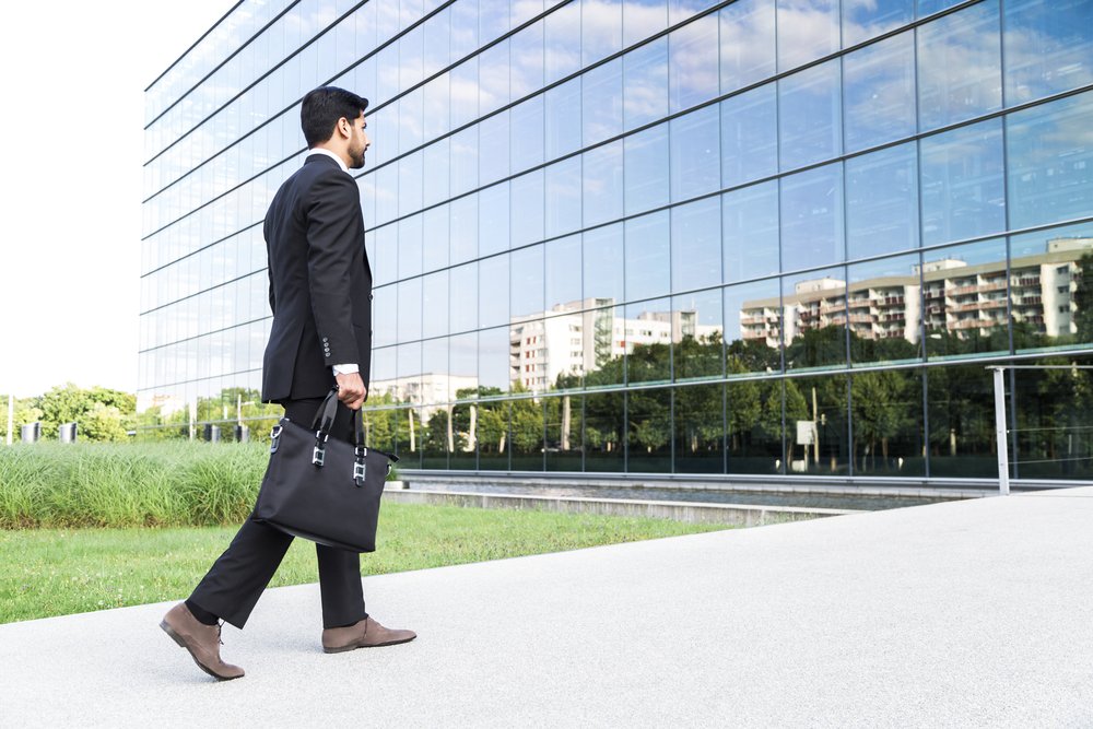 A photo of a man walking into a bank. | Photo: Shutterstock