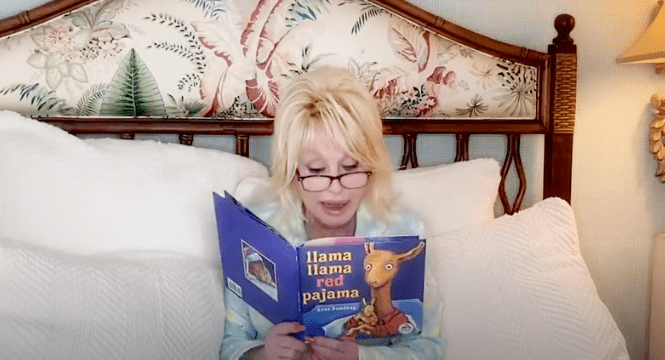 Dolly Parton reads the children's book "Llama Llama Red Pajama" as a part of her "Good Night with Dolly" segments. | Source: YouTube/ Dolly Parton's Imagination Library