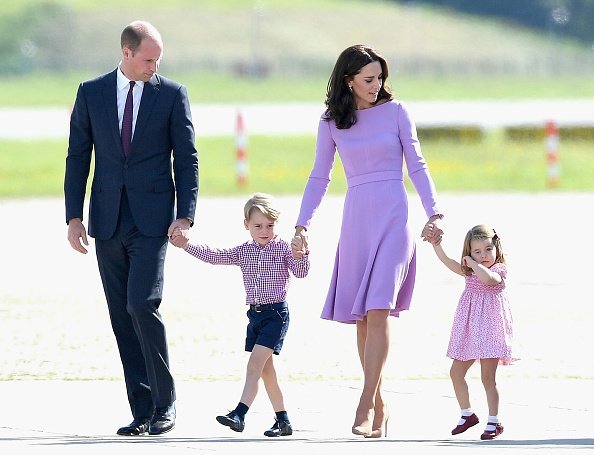 Prince William, Duke of Cambridge, Catherine, Duchess of Cambridge, Prince George of Cambridge and Princess Charlotte of Cambridge view helicopter models H145 and H135 before departing from Hamburg airport on the last day of their official visit to Poland and Germany on July 21, 2017 in Hamburg, Germany | Photo: Getty Images