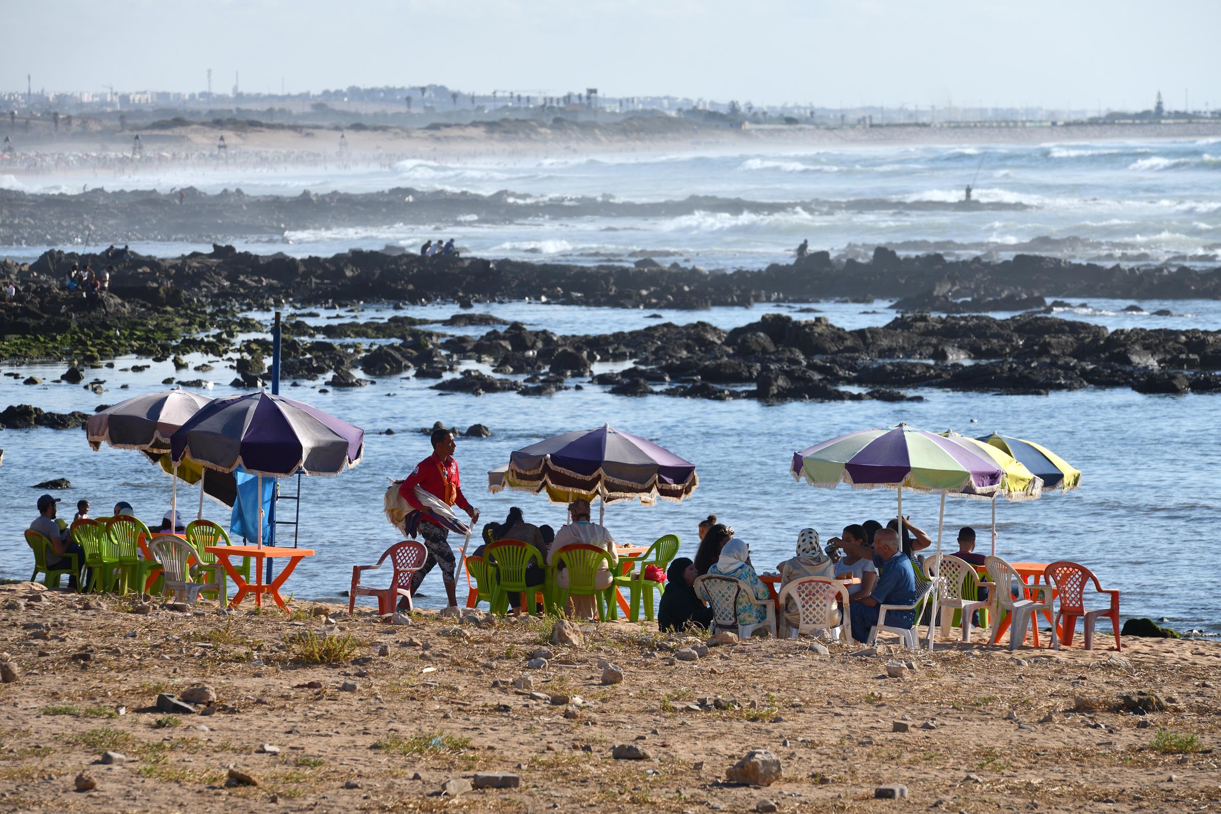 People at a beach in Casablanca on 20 June 2019 in Casablanca, Morocco. | Source: Getty Images