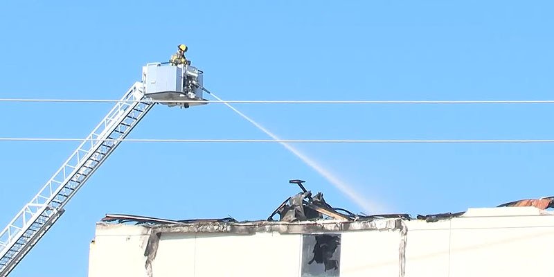 The Killeen Fire Department was still spraying the top floor of the Hilton Garden Inn, in Killeen, Texas, the morning after the fire broke out | Photo: KCENNews
