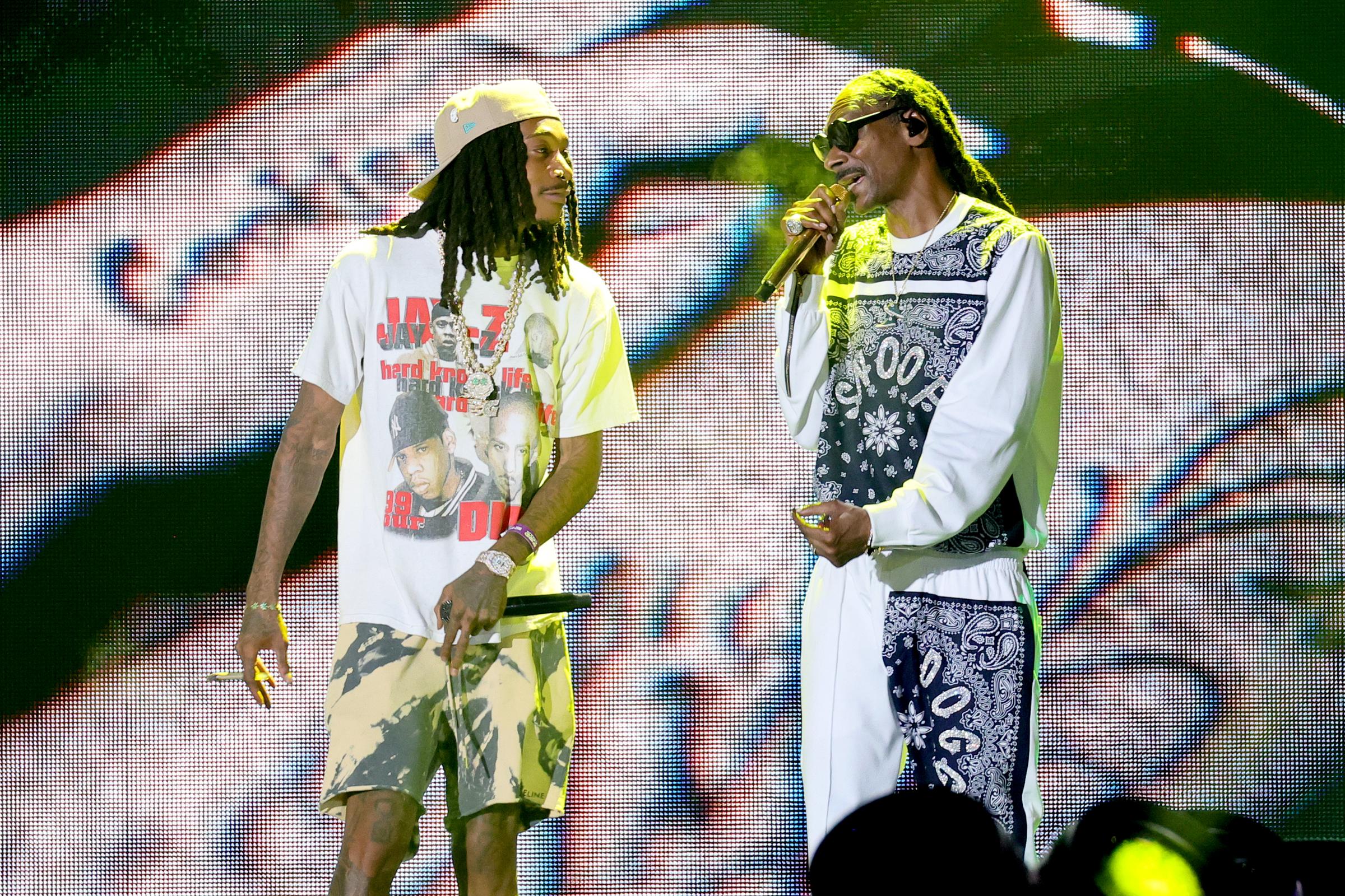 Wiz Khalifa and Snoop Dogg perform at the Adidas x Hip Hop Anniversary event at Yankee Stadium on August 11, 2023, in New York. | Source: Getty Images