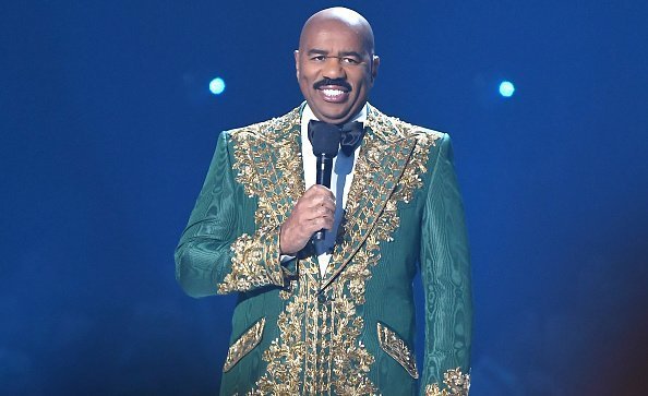 Steve Harvey speaking onstage during 2019 Miss Universe Pageant at Tyler Perry Studios on December 08, 2019 in Atlanta, Georgia.| Photo: Getty Images