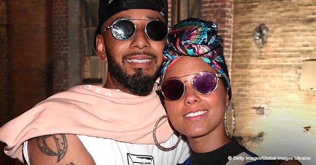 Alicia Keys and husband Swizz Beatz are all smiles in picture with all of his children