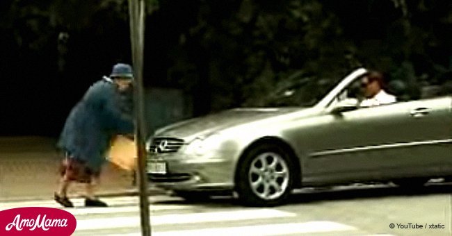 Old lady gets back at man for being rude to her as she crosses the street