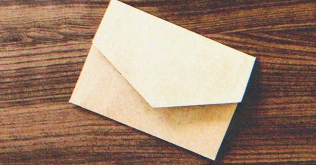 An envelope on a table | Source: Shutterstock