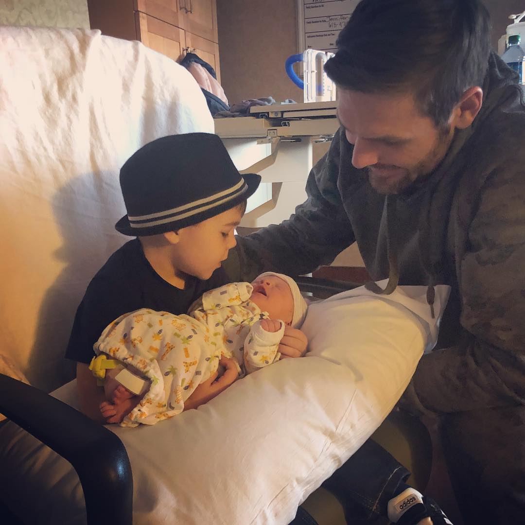 Isaiah, 3, meets his baby brother. Photo credit: Instagram/@carrieunderwood