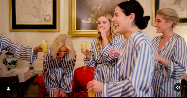 Naomi's bridesmaids toasting and sharing laughs. | Source: Instagram/naomibiden