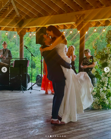 Ian Hock and Eva Amurri sharing a tender moment on their wedding day, posted on July 2, 2024 | Source: Instagram/bri_austen