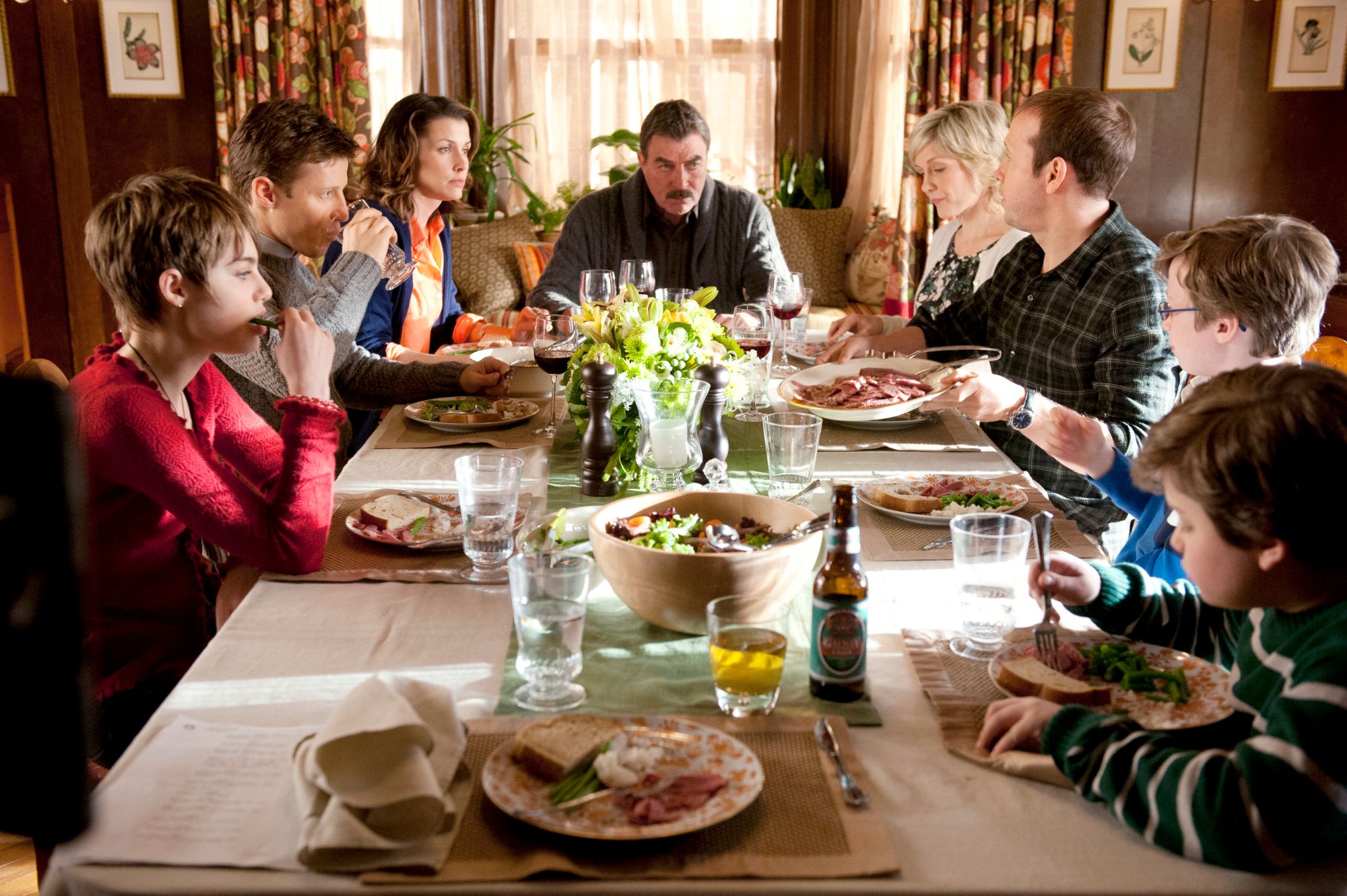 The show's cast: Nicky (Sami Gayle), Jamie (Will Estes), Erin (Bridget Moynahan), Frank (Tom Selleck), Linda (Amy Carlson), Danny (Donnie Wahlberg), Jack (Tony Terraciano) and Sean (Andrew Terraciano) during family dinner, on "Blue Bloods," Friday, March 9. | Source: Getty Images
