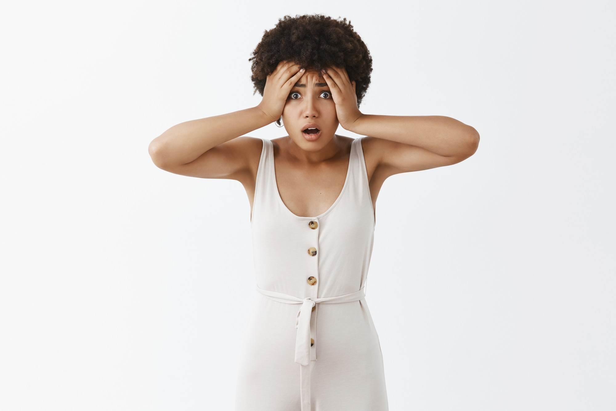 A horrified and embarrassed woman | Source: Freepik