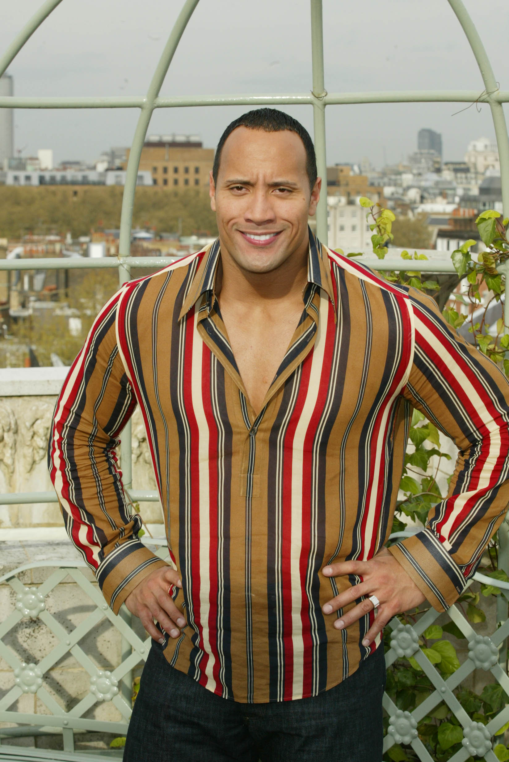 Dwayne Johnson during a photocall to promote his movie "The Scorpion King" at the Dorchester Hotel, London | Source: Getty Images