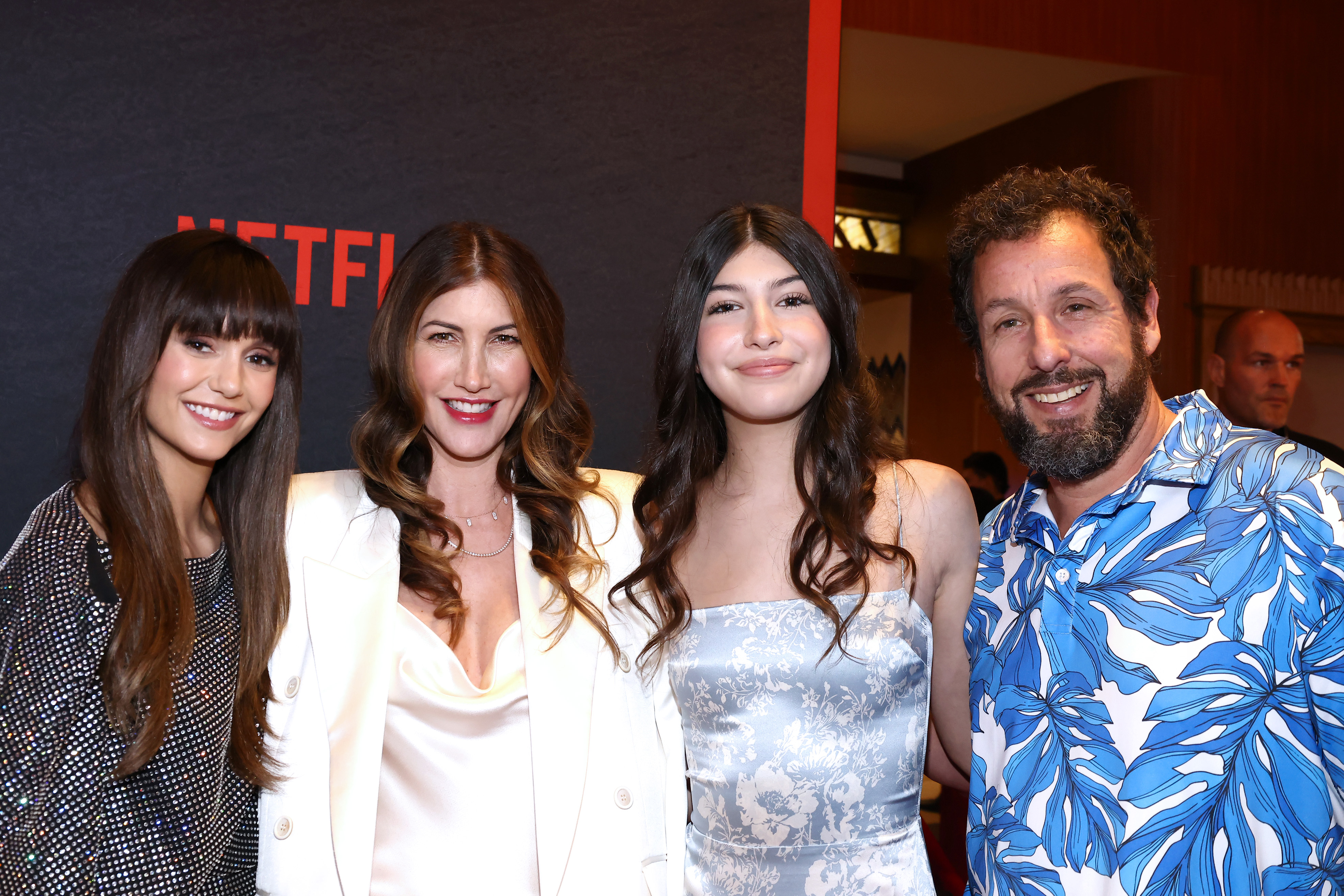 (L-R) Nina Dobrev, Jackie Sandler, Sunny Sandler, and Adam Sandler attend Netflix's special screening of "The Out-Laws," on June 26, 2023 in Los Angeles, California. Source: Getty Images