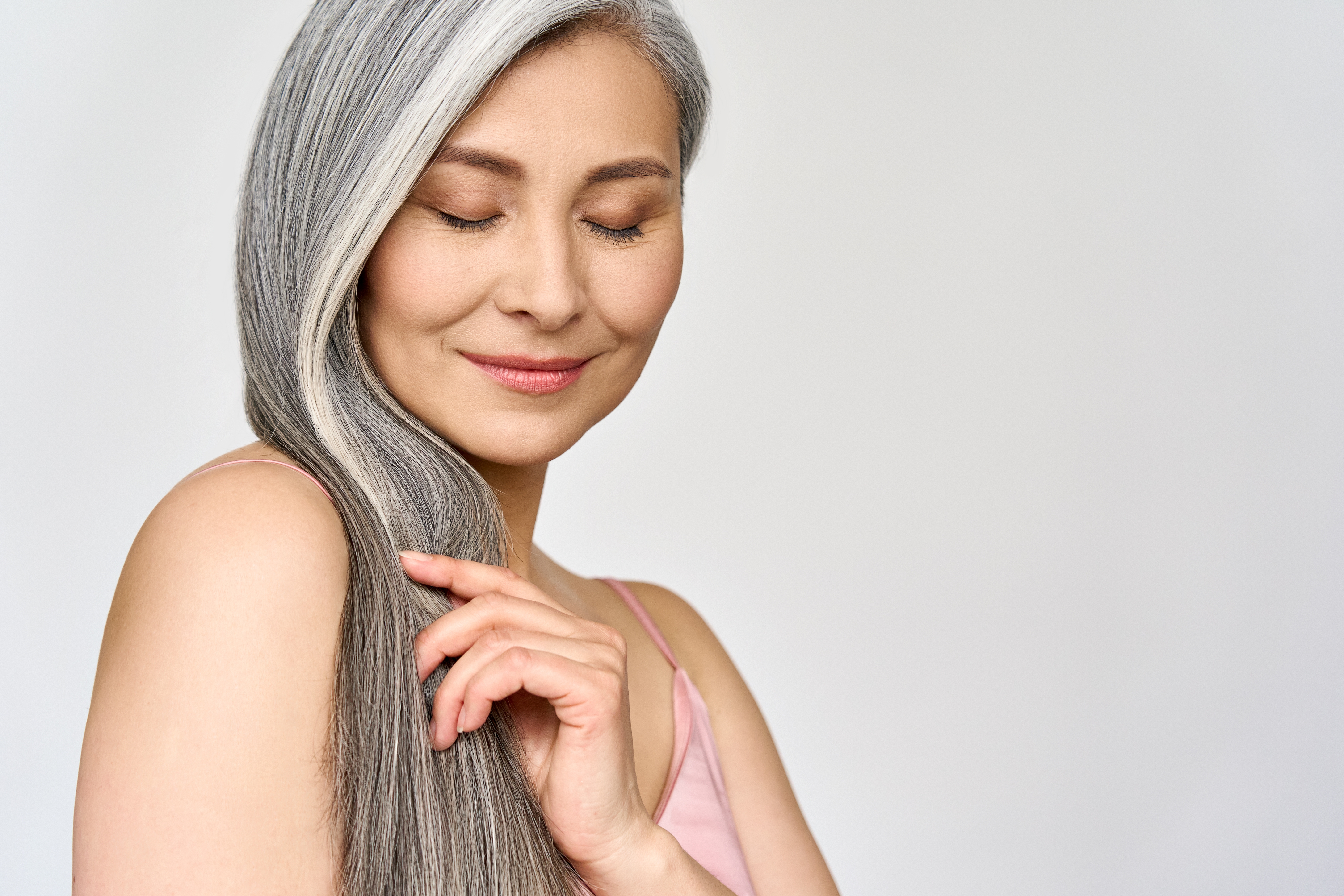 A gray-haired woman | Source: Shutterstock