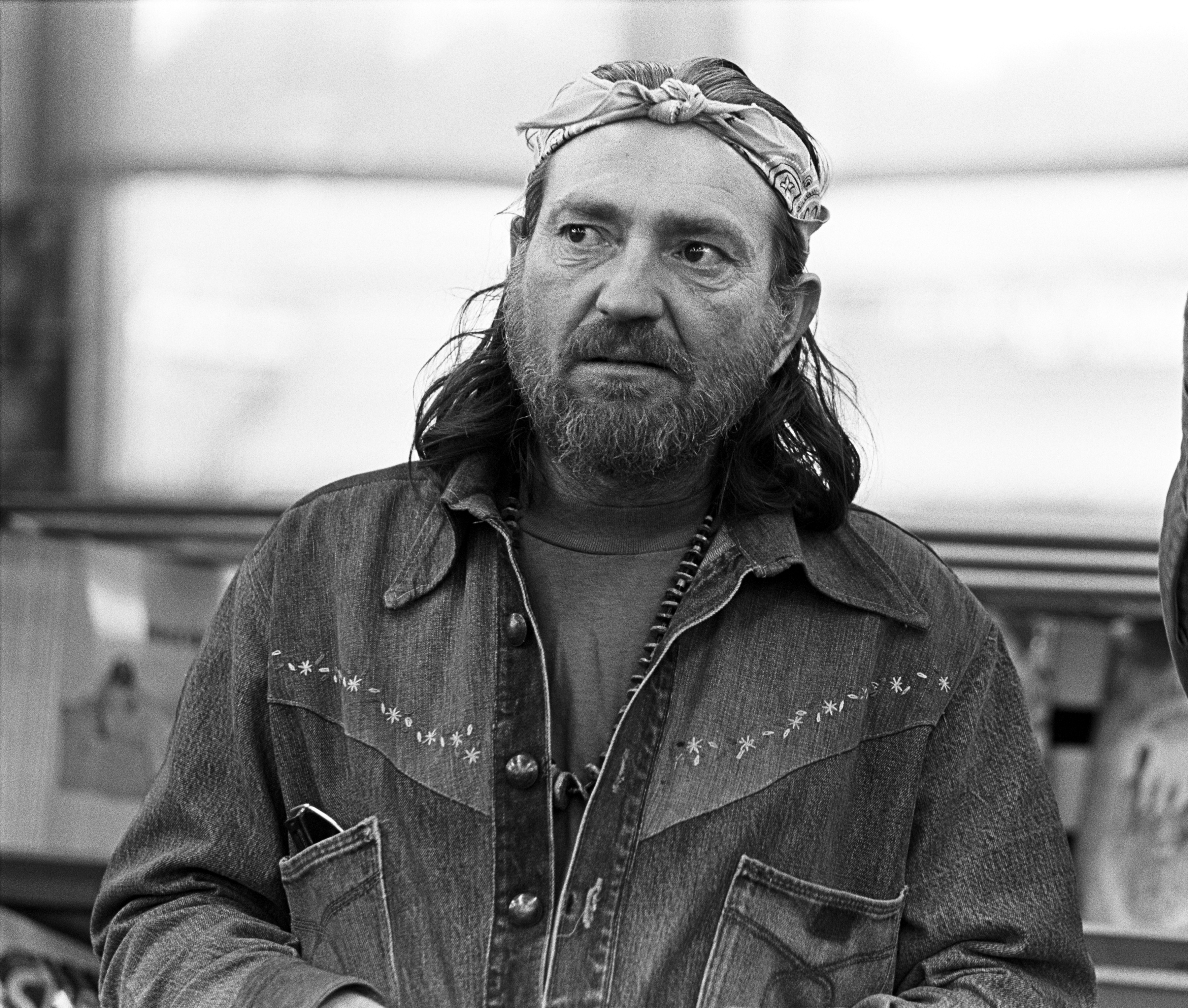Willie Nelson promoting his "Red Headed Stranger" album at Peaches Records on October 28, 1975, in Atlanta, Georgia. | Source: Getty Images