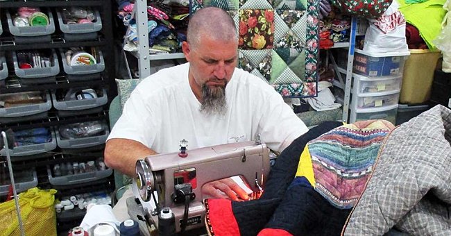 A prison inmate at South Central prison can be seen sewing a quilt. | Photo: facebook.com/jan.carrie.steven