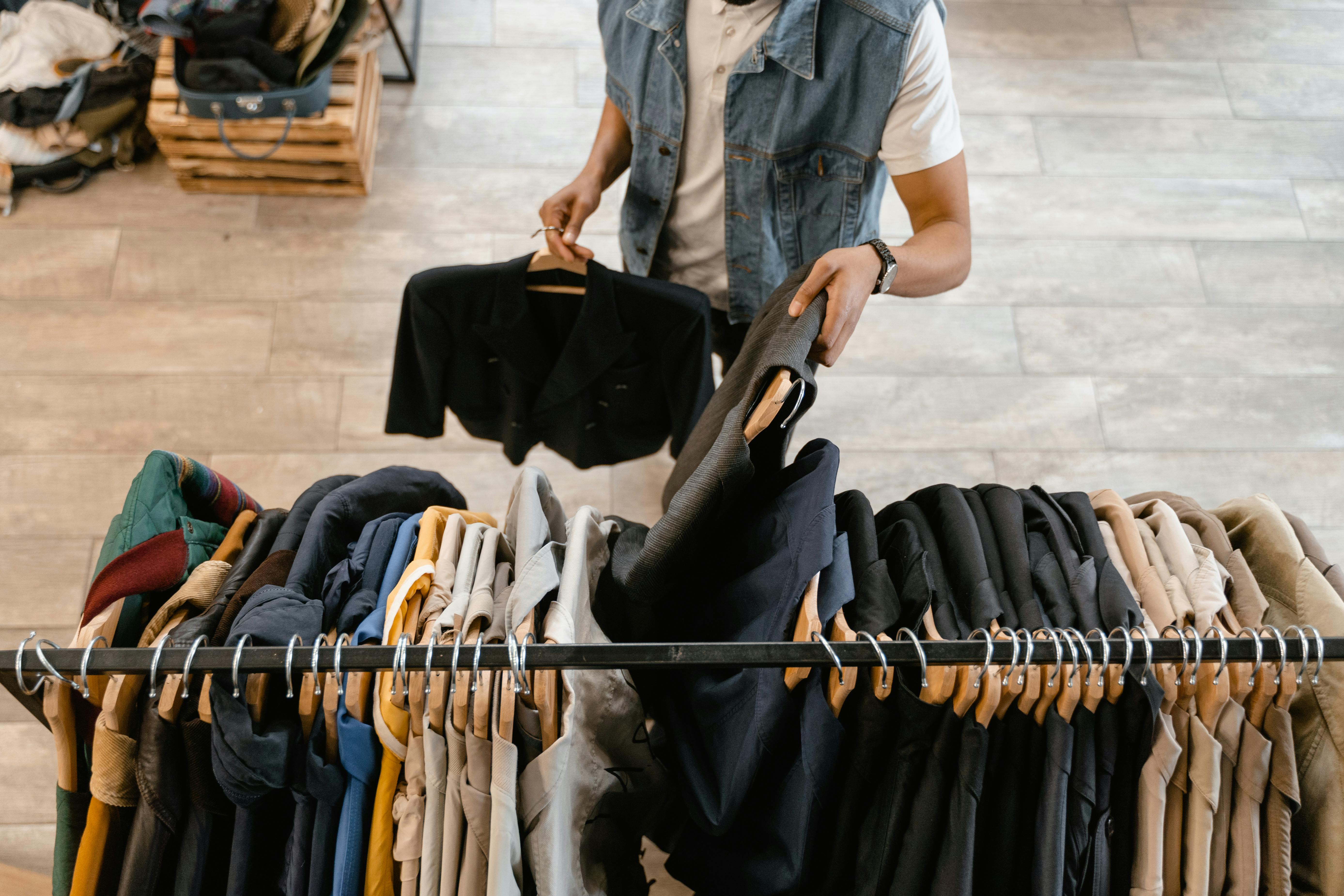 A man selecting clothes | Source: Pexels