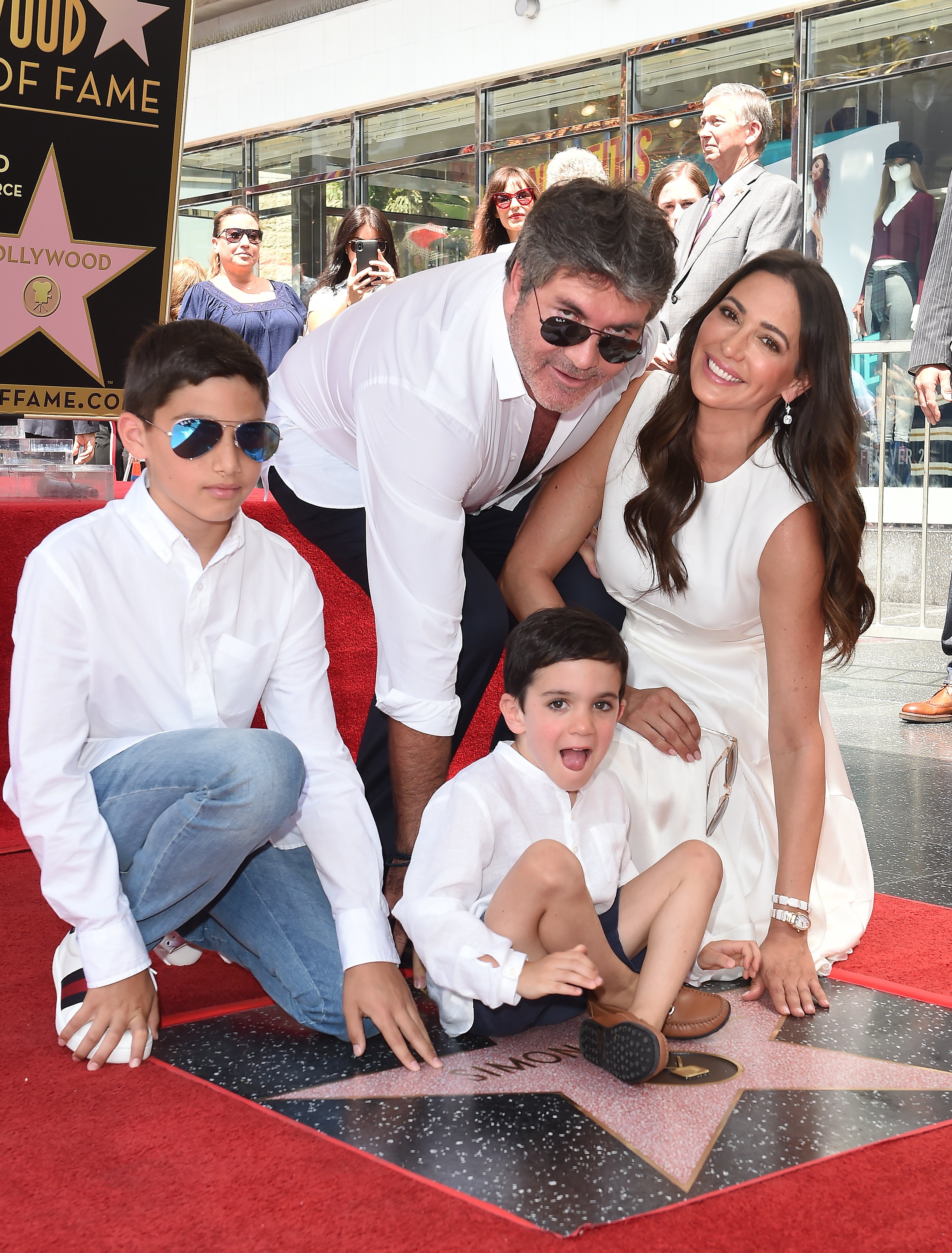 Adam Silverman, Simon Cowell, Lauren Silverman, and Eric Cowell at the ceremony honoring Simon with a star on the Hollywood Walk of Fame on August 22, 2018, in Hollywood, California. | Source: Getty Images