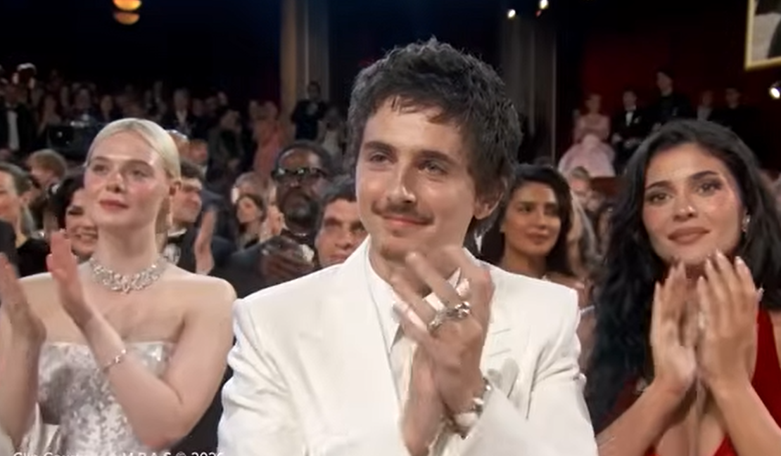 Timothée Chalamet and Kylie Jenner clap as Michael B. Jordan walks up to the stage | Source: Getty Images