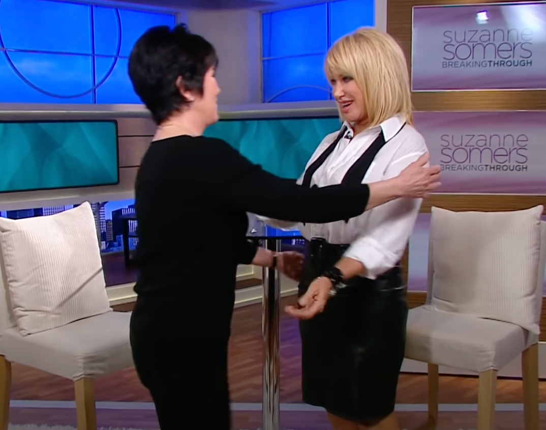 Joyce DeWitt reunites with co-star Suzanne Somers on her talk show "Suzanne Somers: Breaking Through" on February 2, 2012 | Source: YouTube/CafeMomsStudio