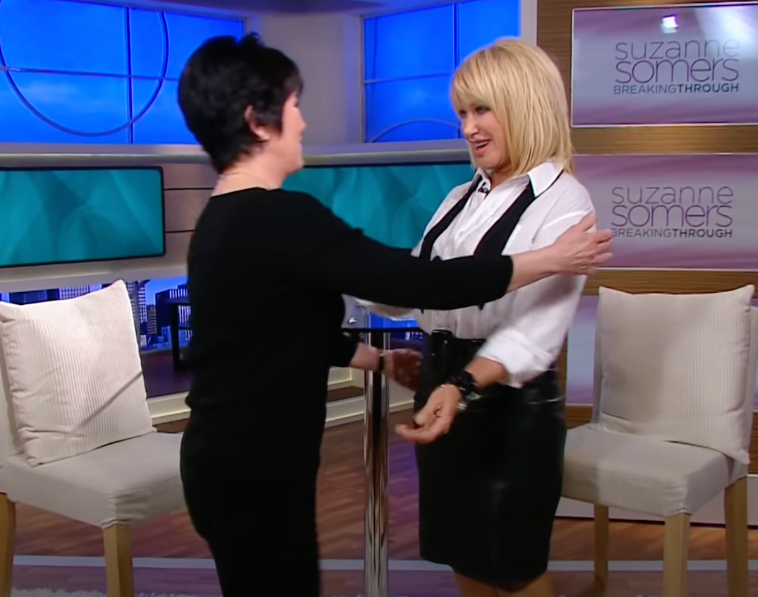 Joyce DeWitt reunites with co-star Suzanne Somers on her talk show "Suzanne Somers: Breaking Through" on February 2, 2012 | Source: YouTube/@CafeMomsStudio