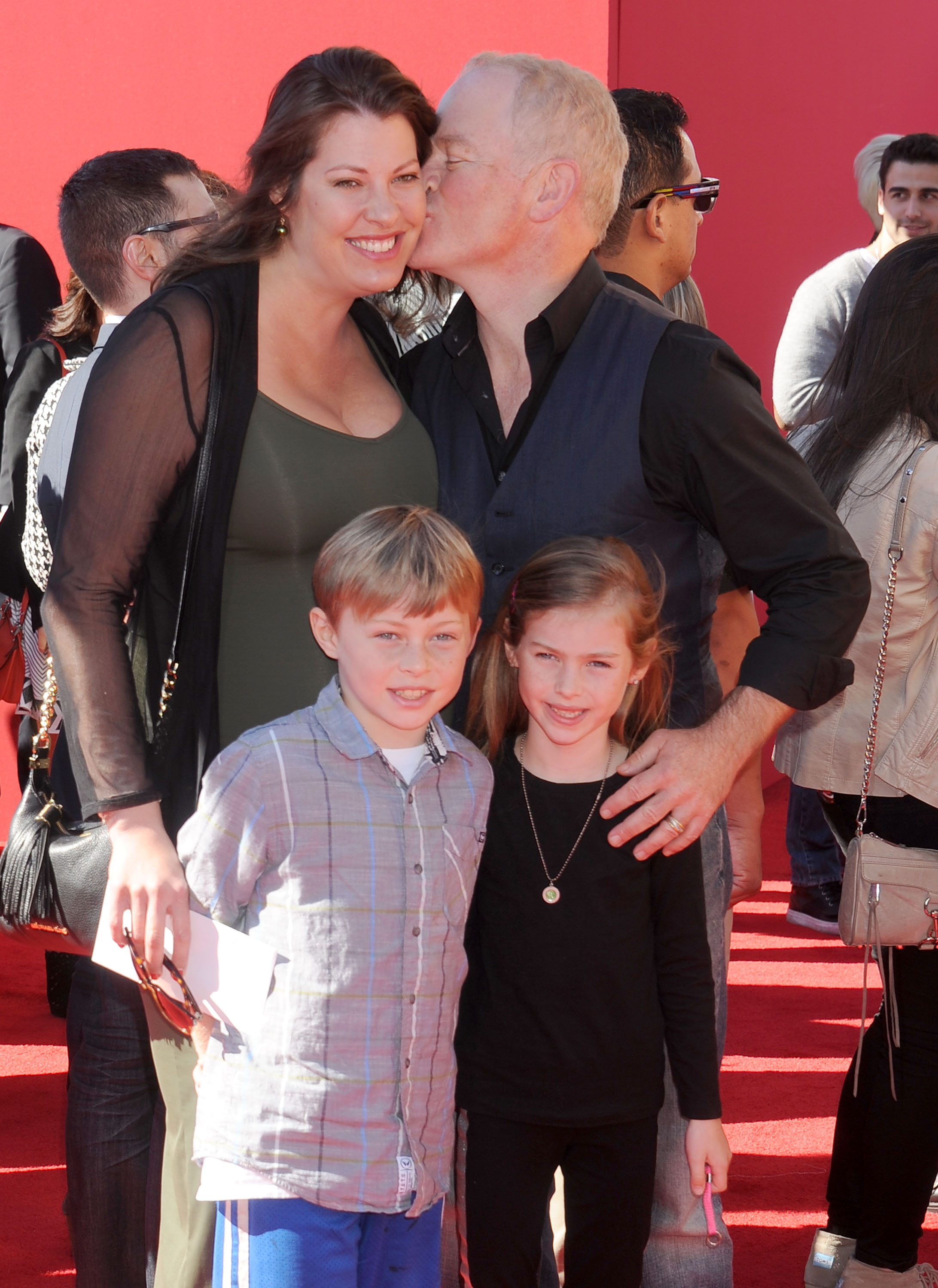 Actor Neal McDonough, wife Ruve Robertson and children arrive at the Los Angeles premiere of "The Lego Movie" at Regency Village Theatre on February 1, 2014, in Westwood, California. | Source: Getty Images