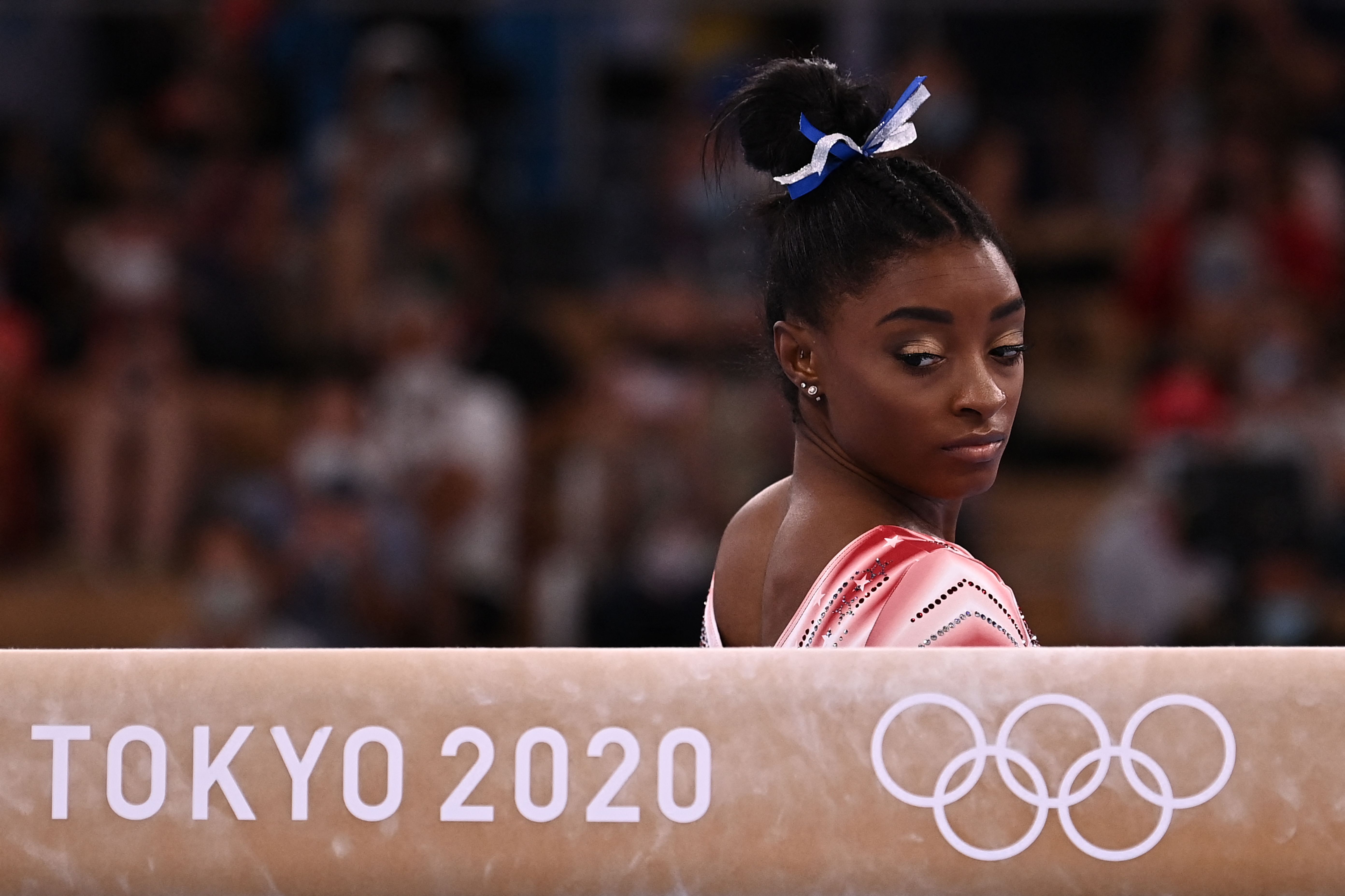 Simone Biles gets ready to compete in the artistic gymnastics women's balance beam final of the Tokyo 2020 Olympic Games, at Ariake Gymnastics Centre, in Tokyo, on August 3, 2021. | Source: Getty Images