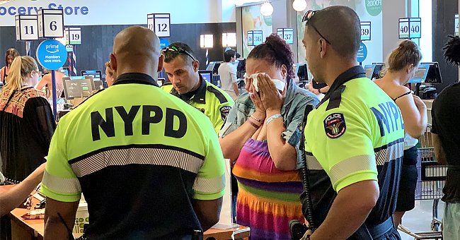 Woman in tears as NYDP officers paid for food she stole. | Photo:  twitter.com/pboz