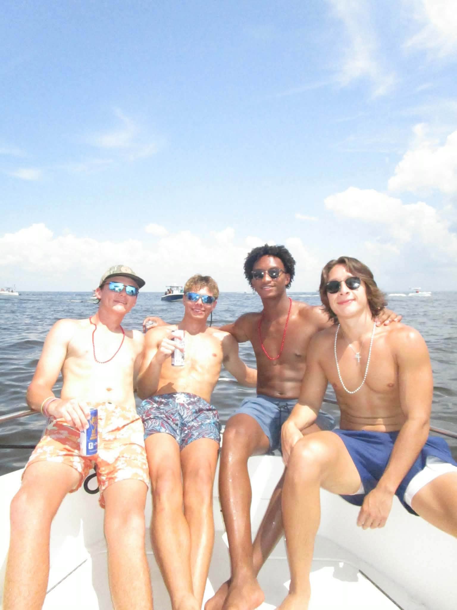 Nolan Wells was known by most of his friends as a protector. Here's a photo of him with other friends on their trip to an island in Mississippi on July 4, 2026. | Source: Facebook/Christine Wonsley
