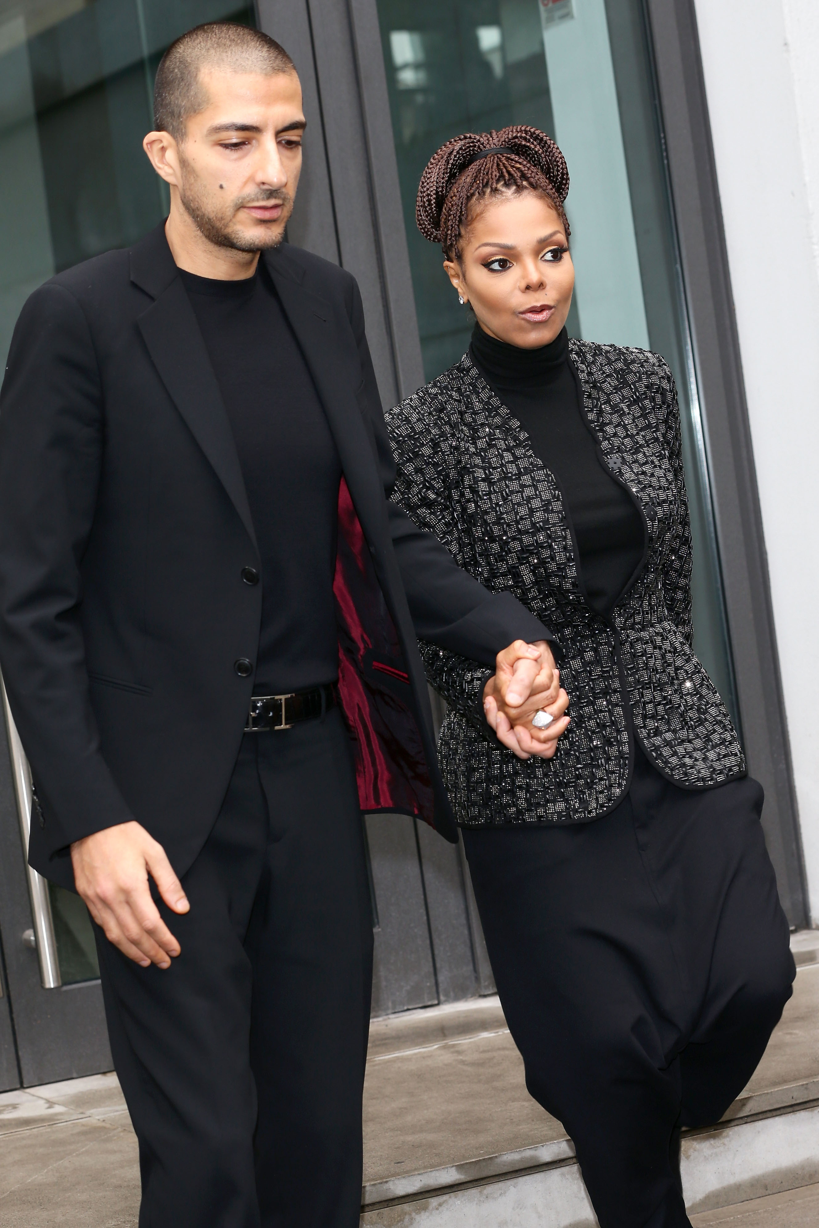 Wissam al Mana and Janet Jackson at the Giorgio Armani fashion show as part of Milan Fashion Week Womenswear Fall/Winter 2013/14 on February 25, 2014, in Milan, Italy | Source: Getty Images