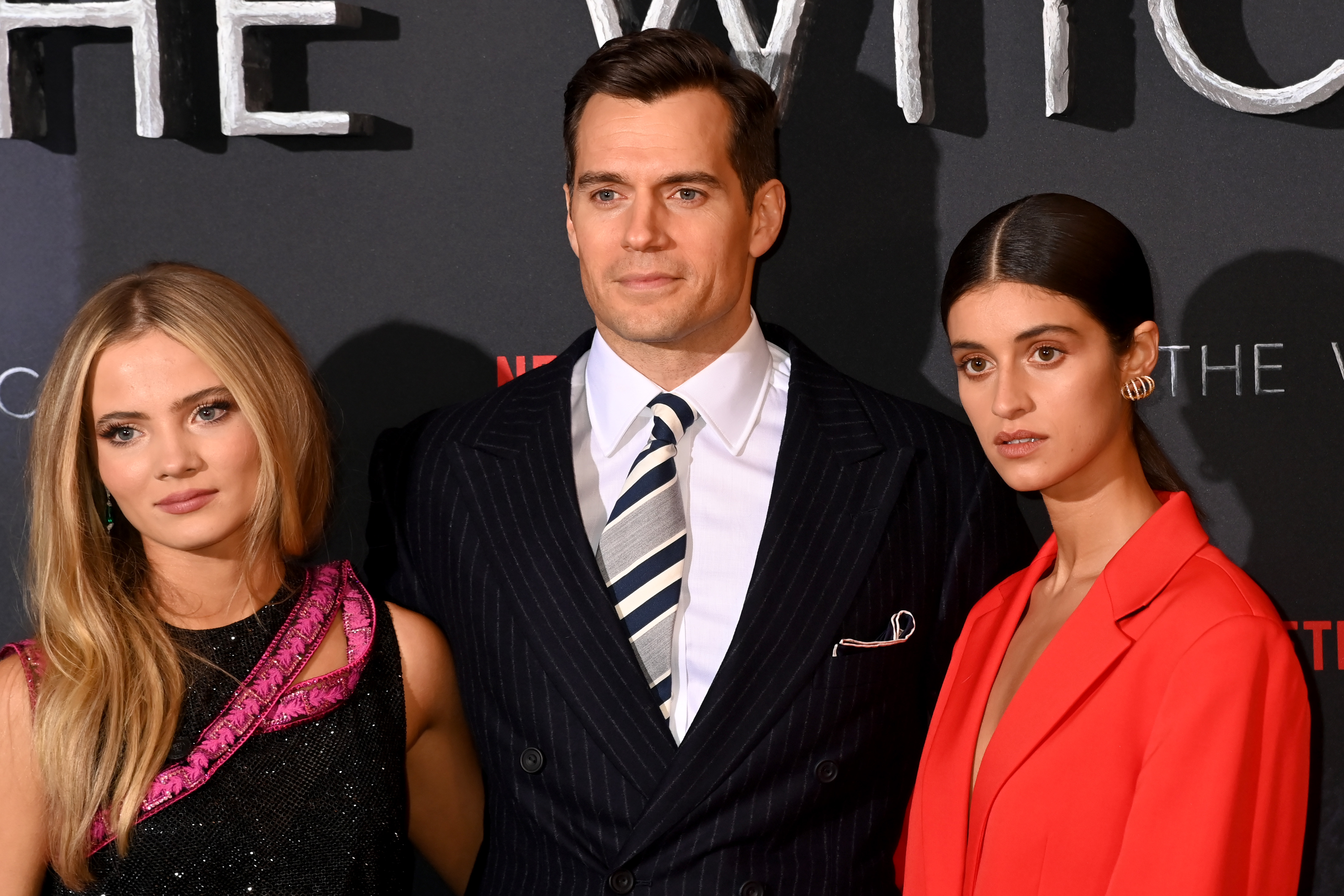 Freya Allan, Henry Cavill and, Anya Chalotra attend the world premiere of "The Witcher: Season 2" at Odeon Luxe Leicester Square, on December 1, 2021, in London, England. | Source: Getty Images