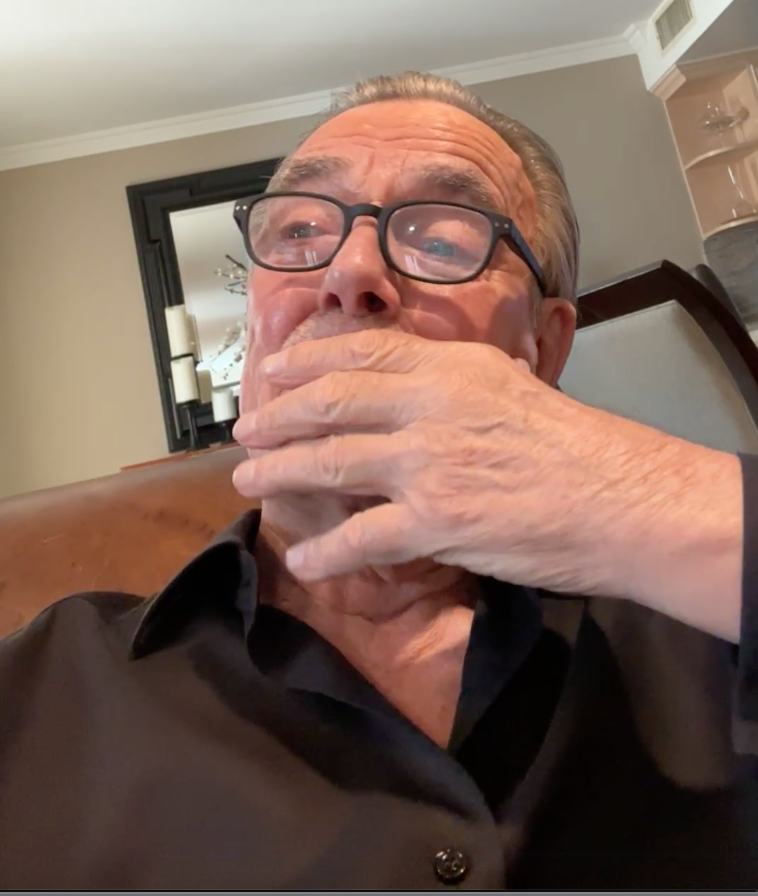 Eric Braeden with his hand on his mouth during his live Facebook session | Source: facebook.com/officialericbraeden/