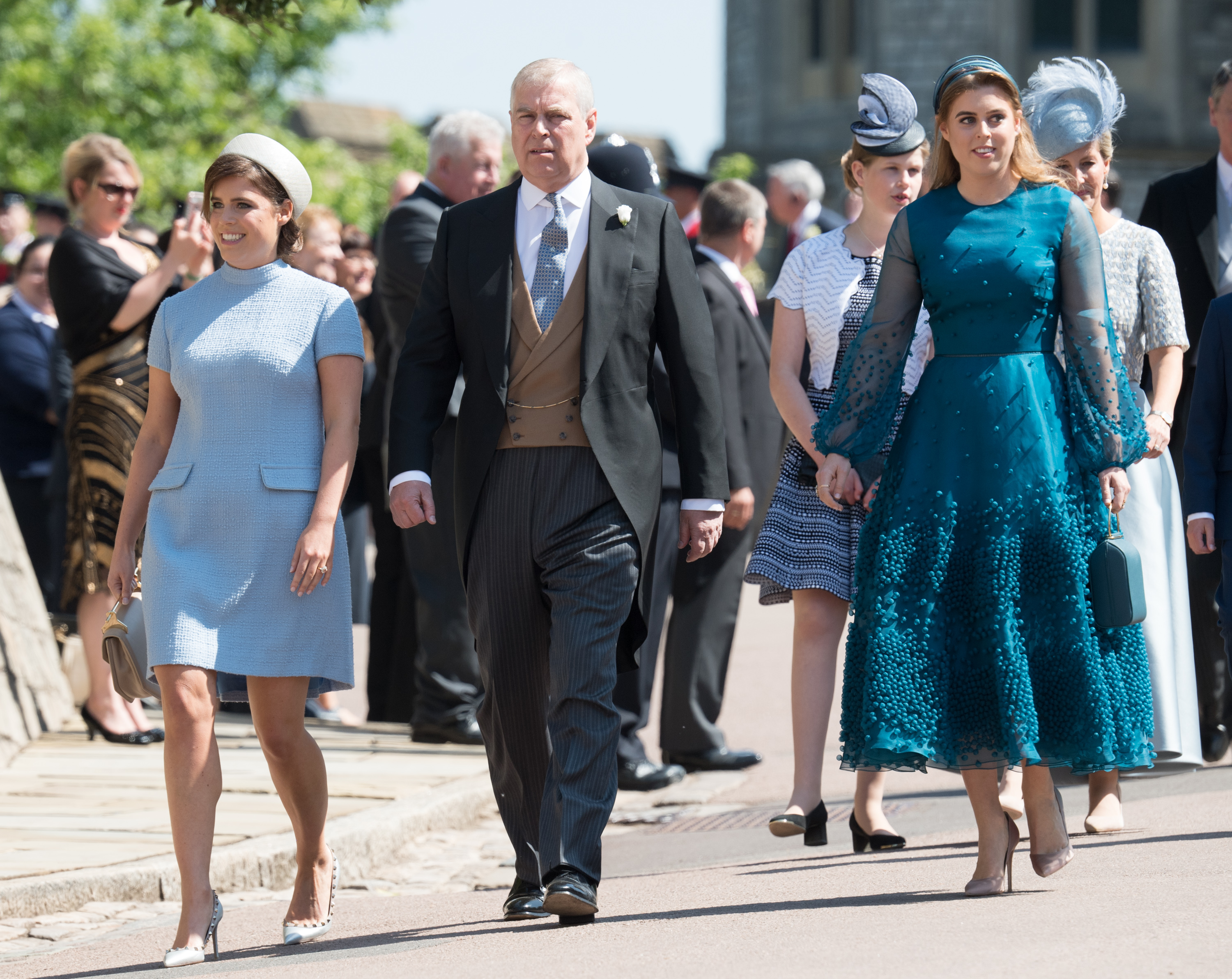 Princess Eugenie of York, Andrew Mountbatten-Windsor, and Princess Beatrice of York arrive for the wedding ceremony of Prince Harry, Duke of Sussex and Meghan, Duchess of Sussex at St George's Chapel on 19 May 2018 in Windsor. | Source: Getty Images