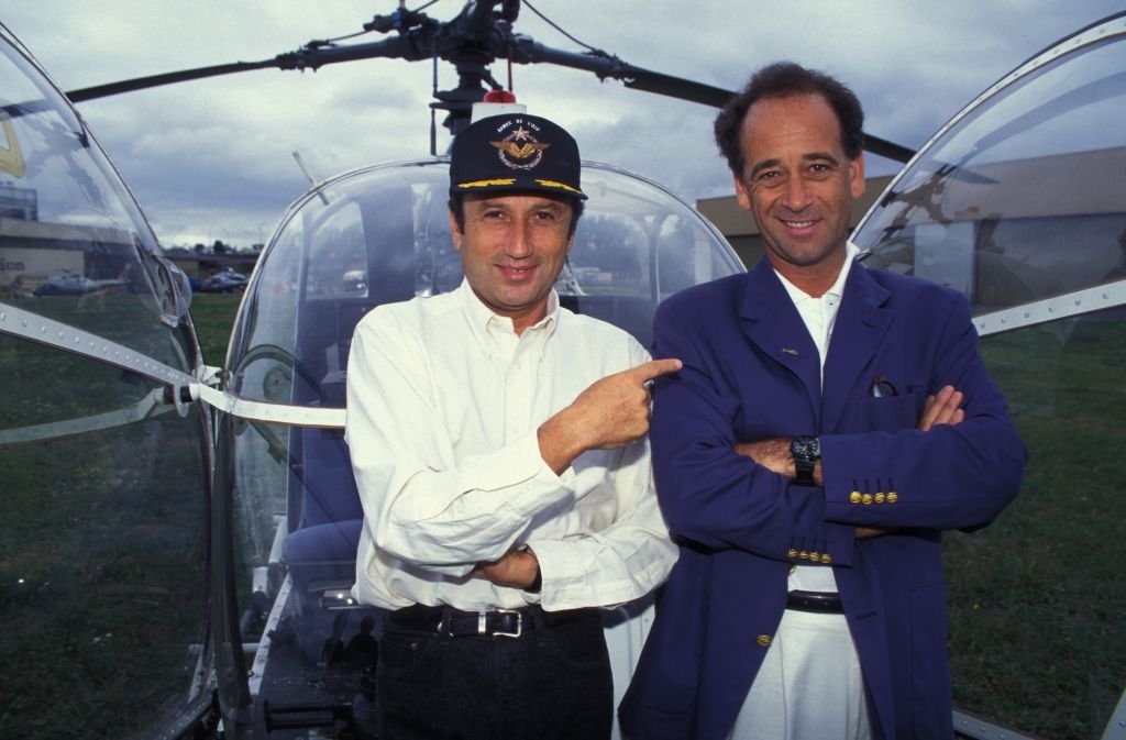 Michel Drucker et Sylvain Augier en août 1994 en France. | Source : Getty Images