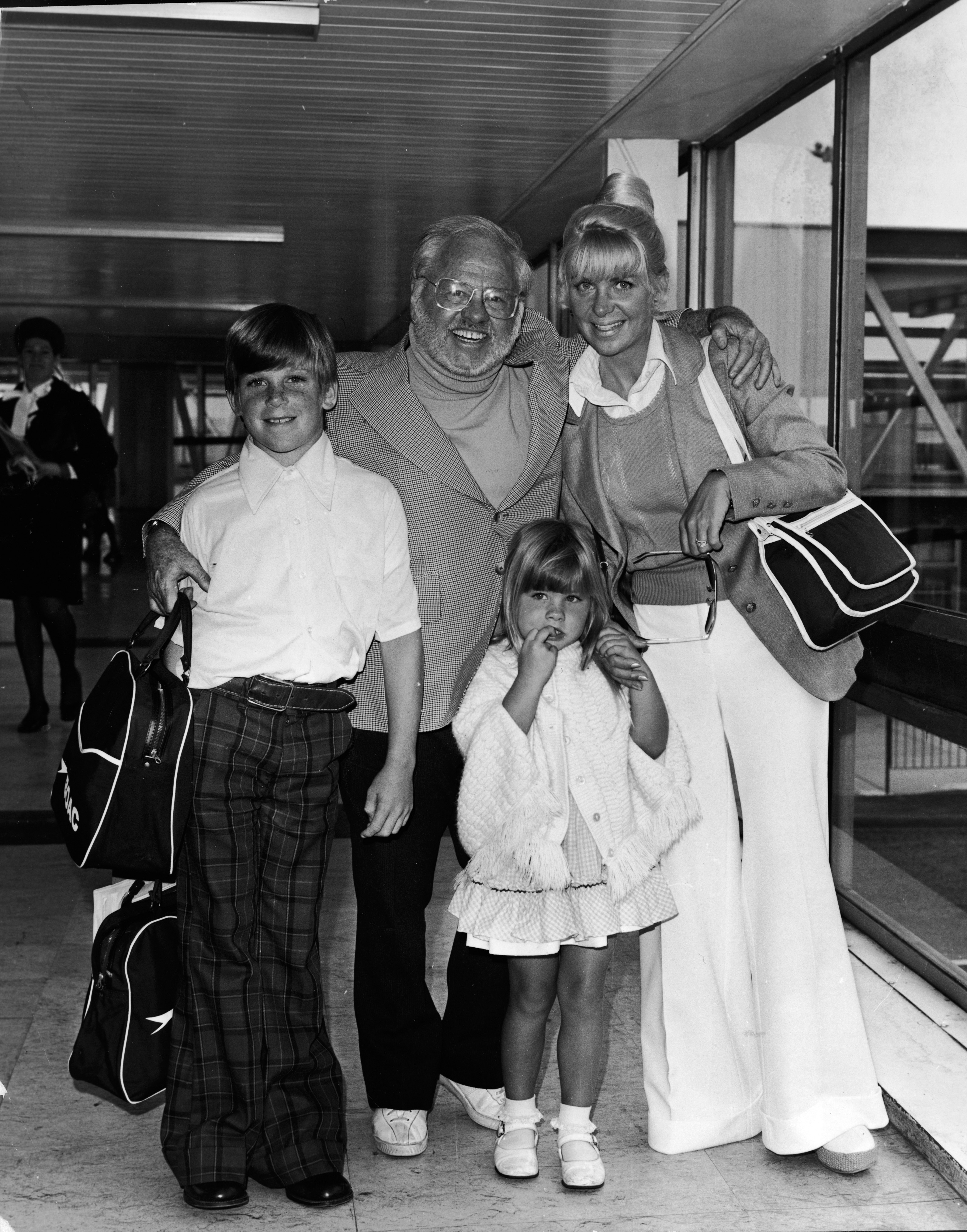 Mickey Rooney, Carolyn Hockett, Jimmy, and Jonella at Heathrow Airport, London, in June 1974.