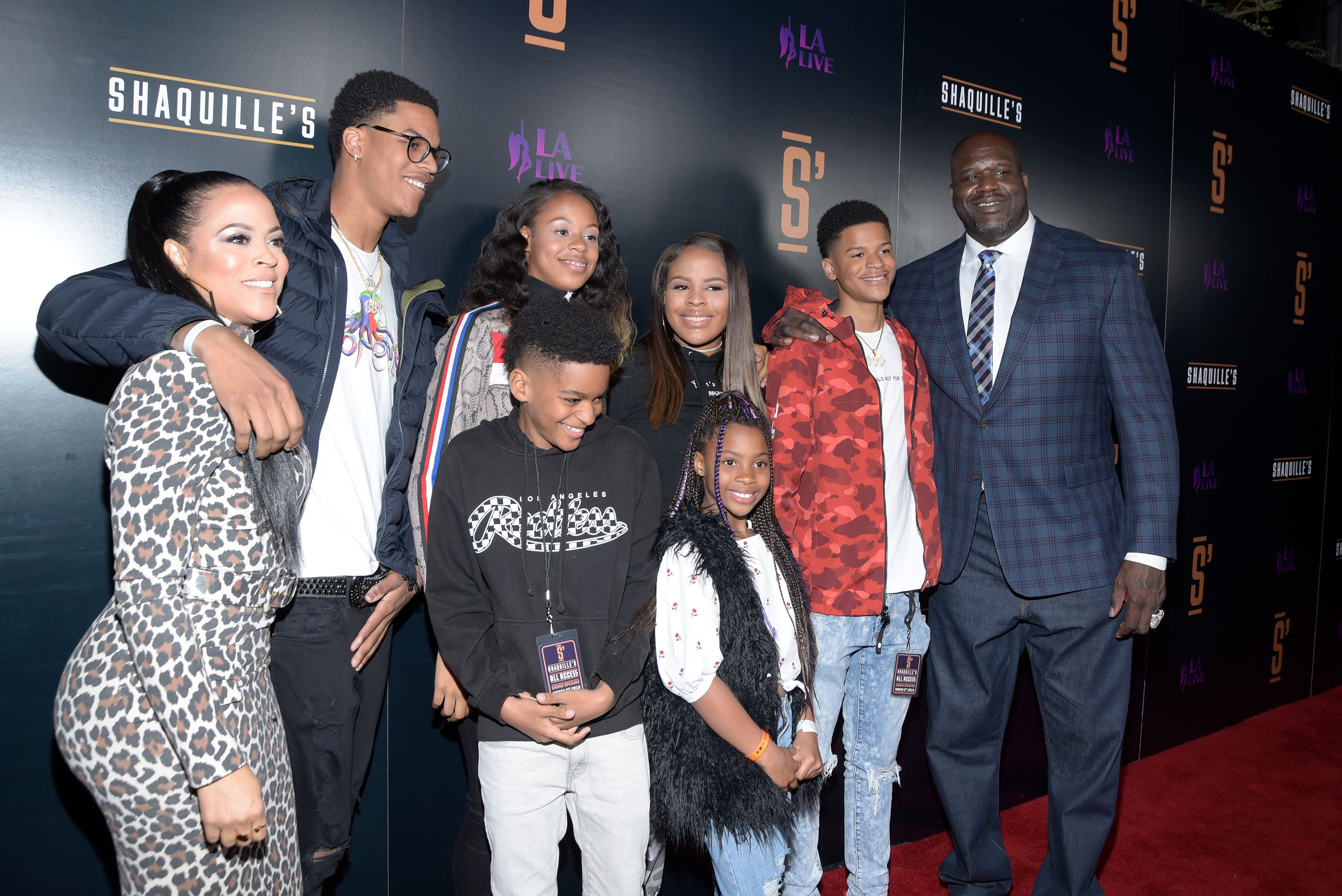 Shaunie O'Neal and Shaquille O'Neal and their family pose on the red carpet at the opening of Shaquille's At L.A. Live on March 09, 2019, in Los Angeles, California | Source: Michael Tullberg/Getty Images