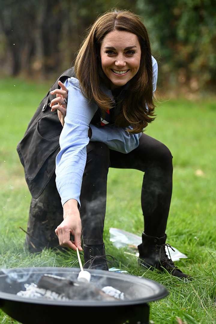 Kate Middleton toasting marshmallows during her visit to a Scout Group in Northolt, northwest London in September 2020. I Image: Getty Images.