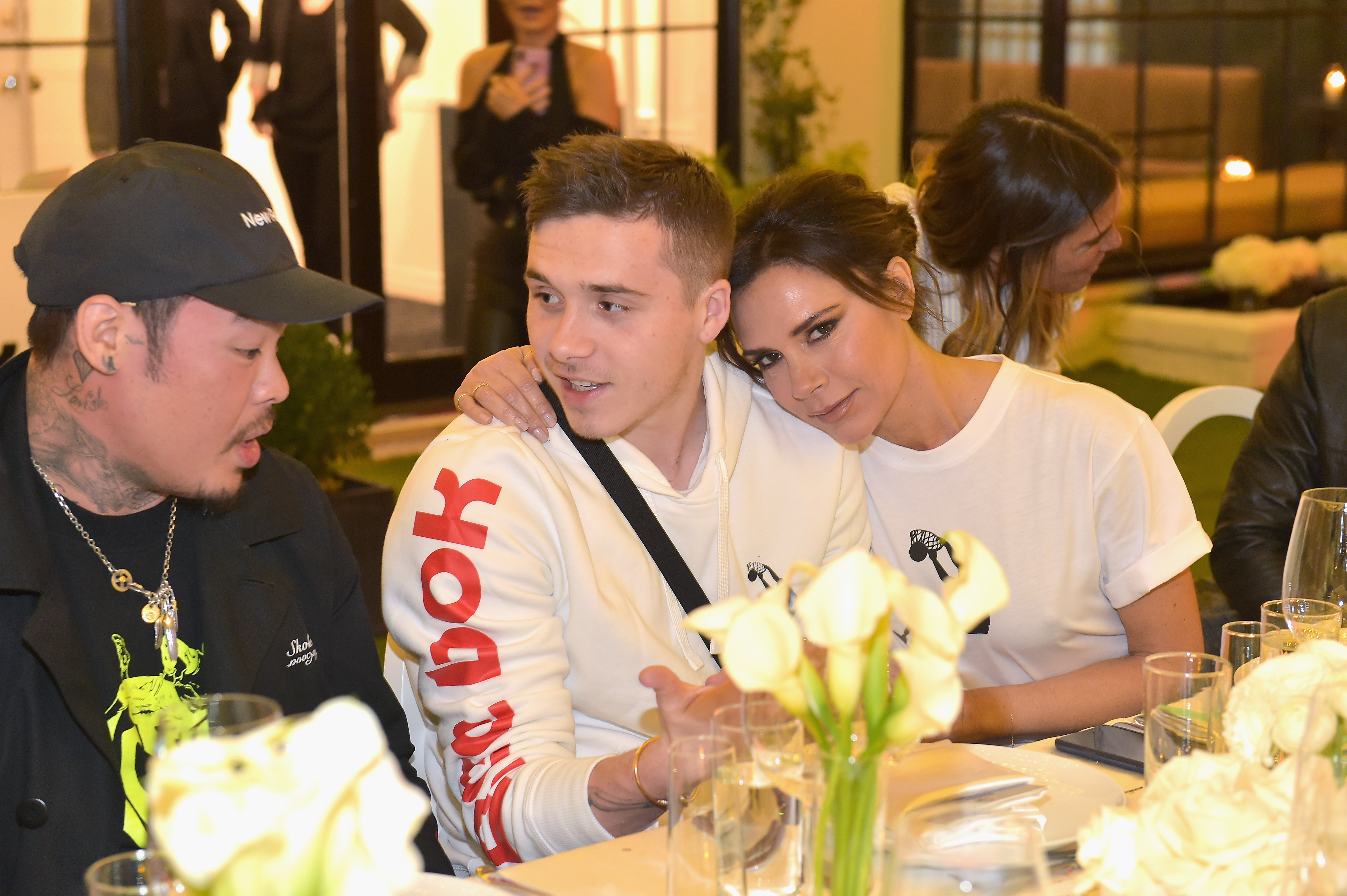 Dr. Woo, Brooklyn Beckham and Victoria Beckham an event celebrating Reebok and Victoria Beckham's partnership at The House on Sunset on 12 April 2018 in Beverly Hills, California. | Source: Getty Images