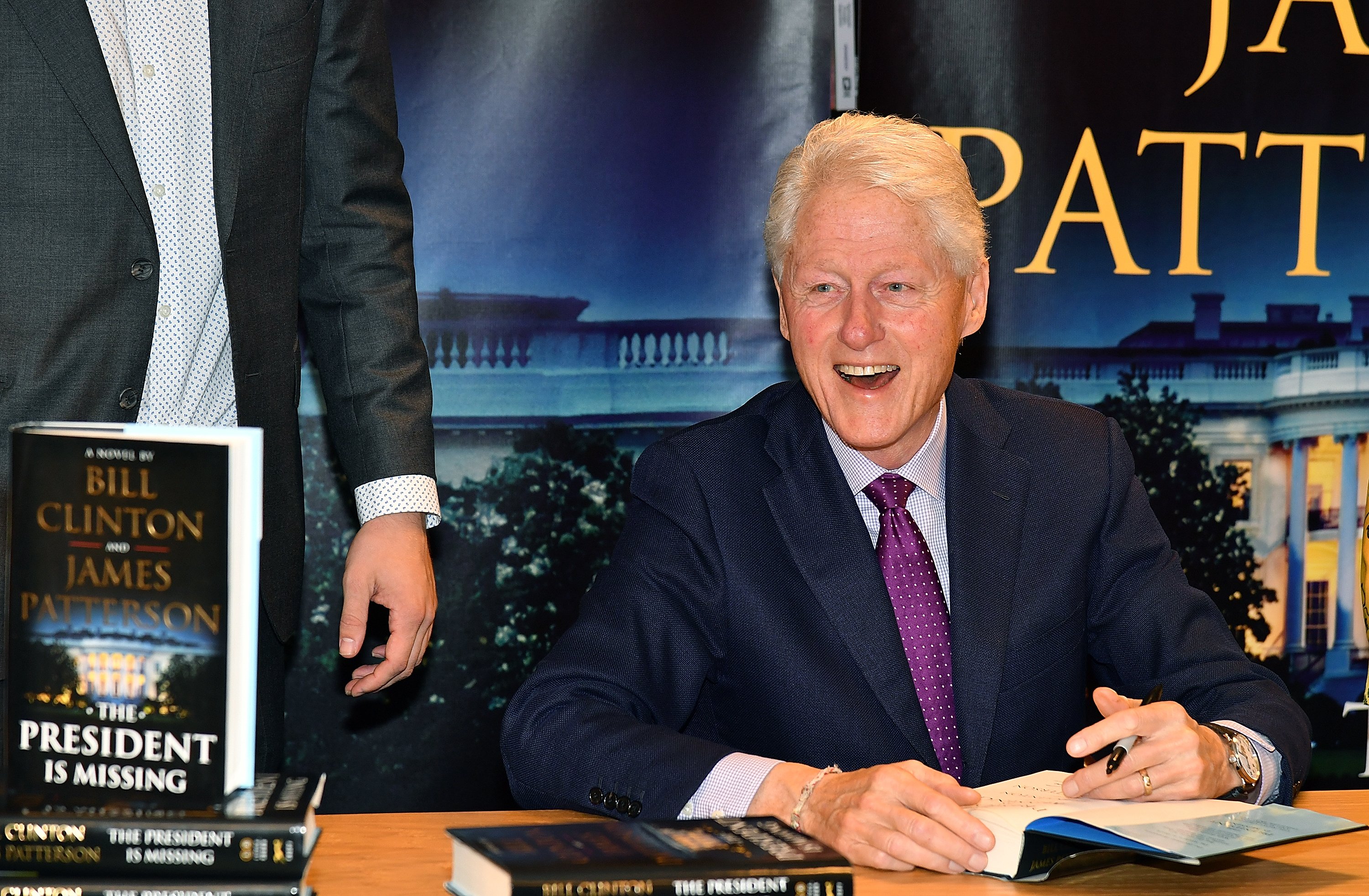 Bill Clinton signs copies of his new book co-authored with James Patterson "The President Is Missing" at Barnes & Noble on June 5, 2018 in New York City | Photo: Getty Images