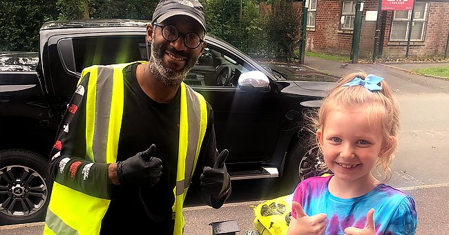 A picture of delivery driver, Tim Joseph, and Tallulah | Photo: twitter.com/mummybear1903