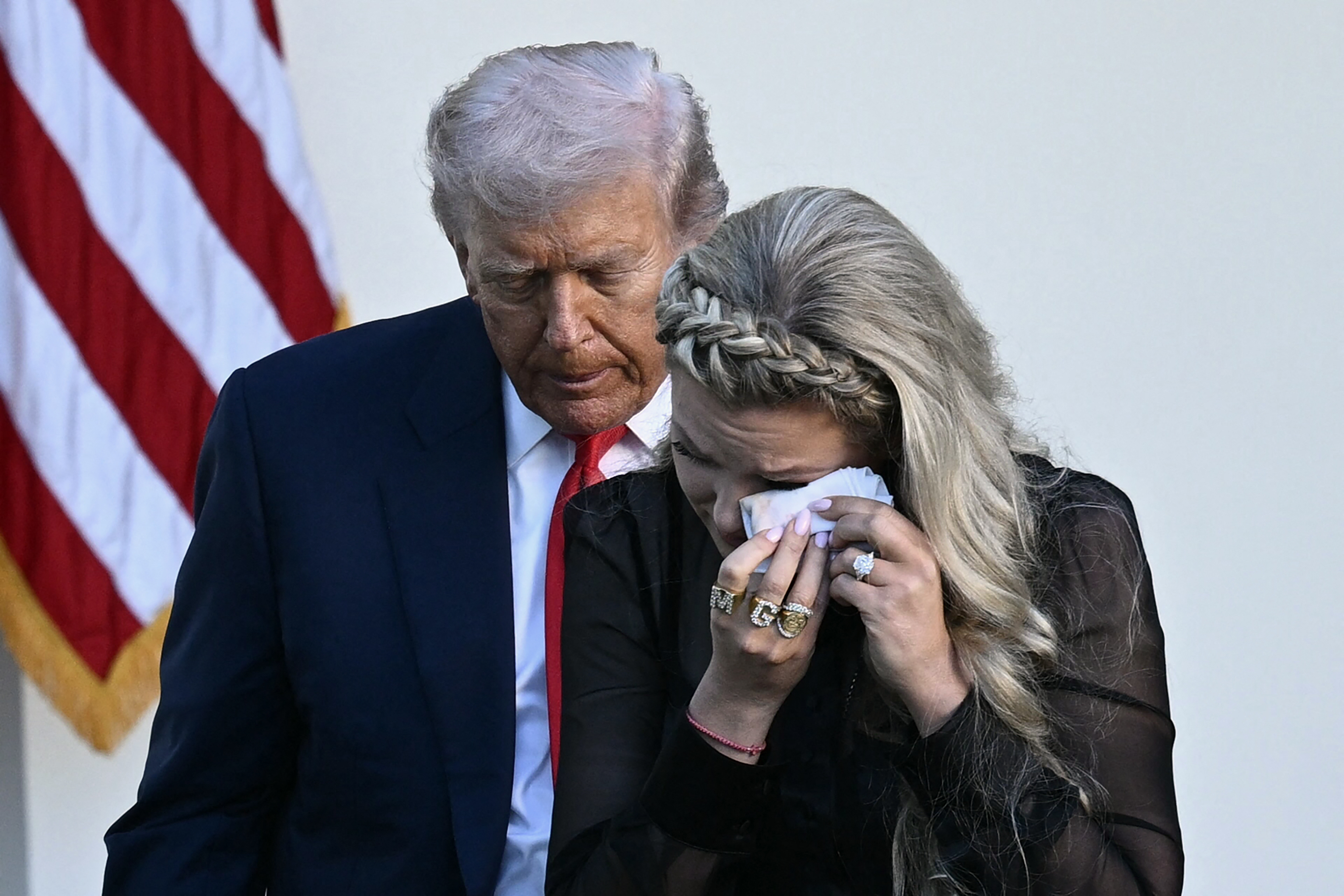 Erika Kirk becomes emotional as Donald Trump posthumously awards the Presidential Medal of Freedom to Charlie Kirk in the Rose Garden on October 14, 2025 in Washington, DC | Source: Getty Images