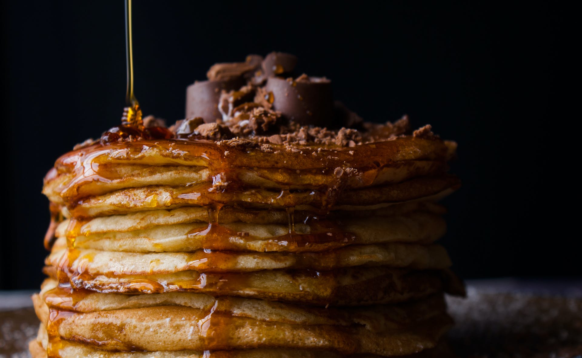 Pancake stack with honey | Source: Pexels