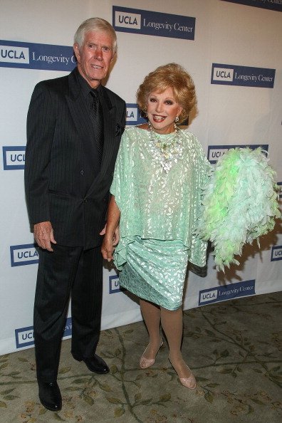 Webster B. Lowe Jr. and Ruta Lee at Beverly Hills Hotel on May 21, 2013 in Beverly Hills, California. | Photo: Getty Images