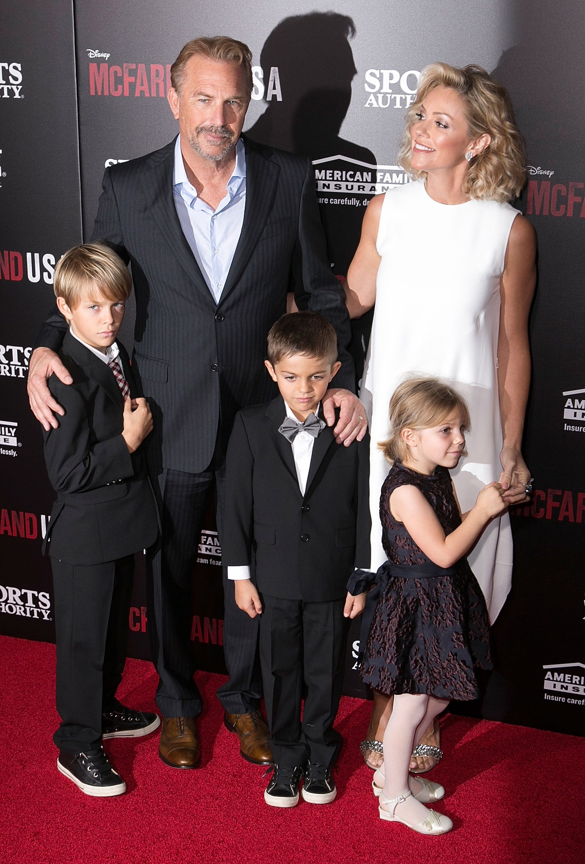Actor Kevin Costner with Christine Baumgartner and their children at the El Capitan Theatre in Hollywood California on February 9, 2015 | Source: Getty Images