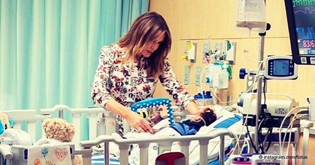 Melania Trump just shared new photos from a children’s hospital giving high fives to sick kids