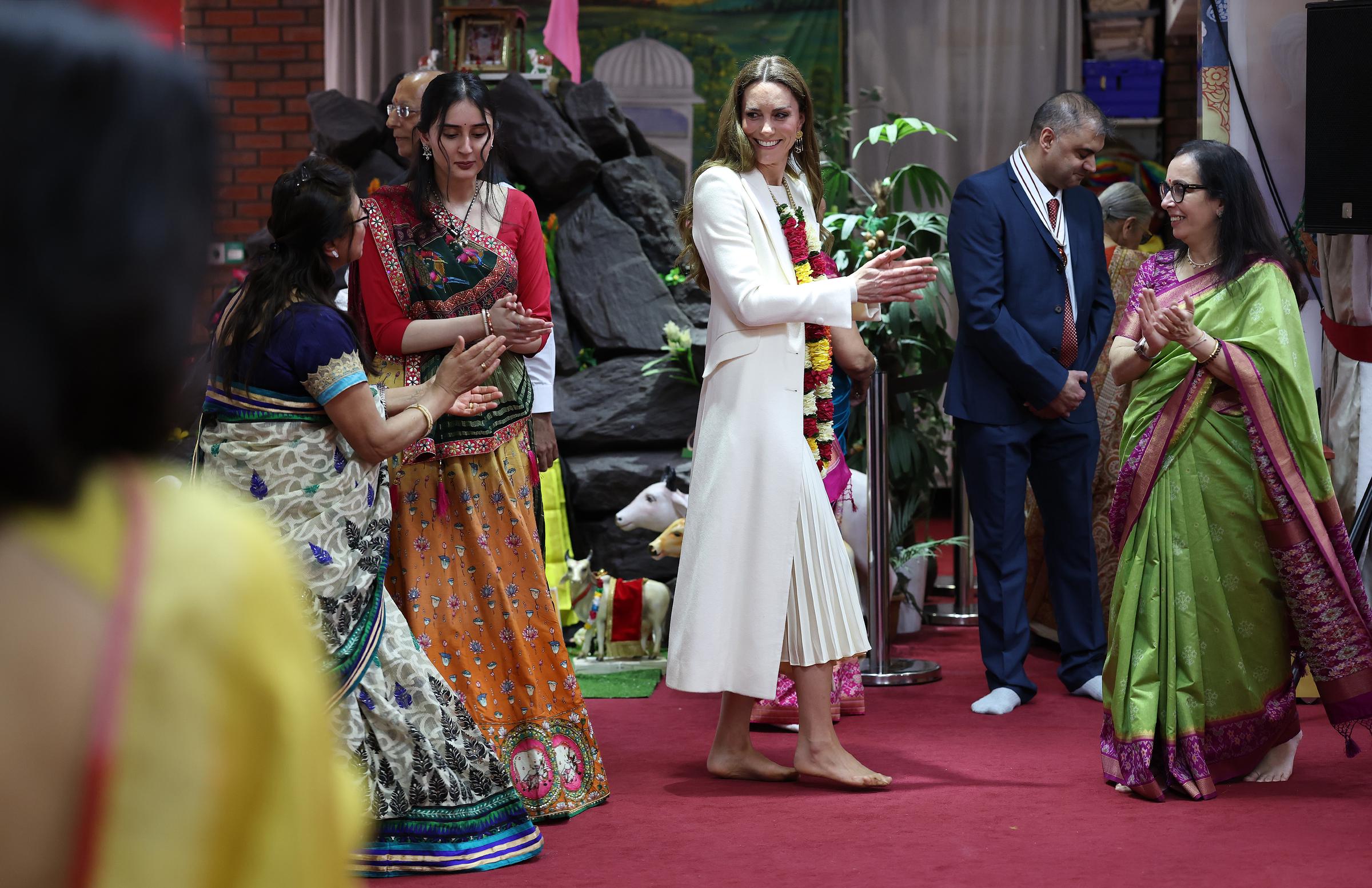 Princess Catherine takes part in a dance during her visit to the Shreeji Dham Haveli Hindu Temple on March 5, 2026 in Leicester, England. | Source: Getty Images