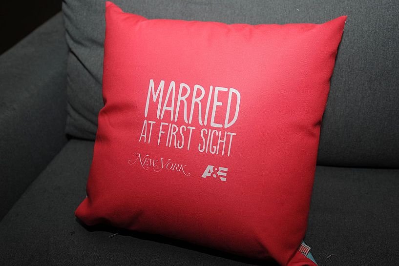A promotional pillow advertising reality show Married At First Sight.  Source | Photo: Getty Image
